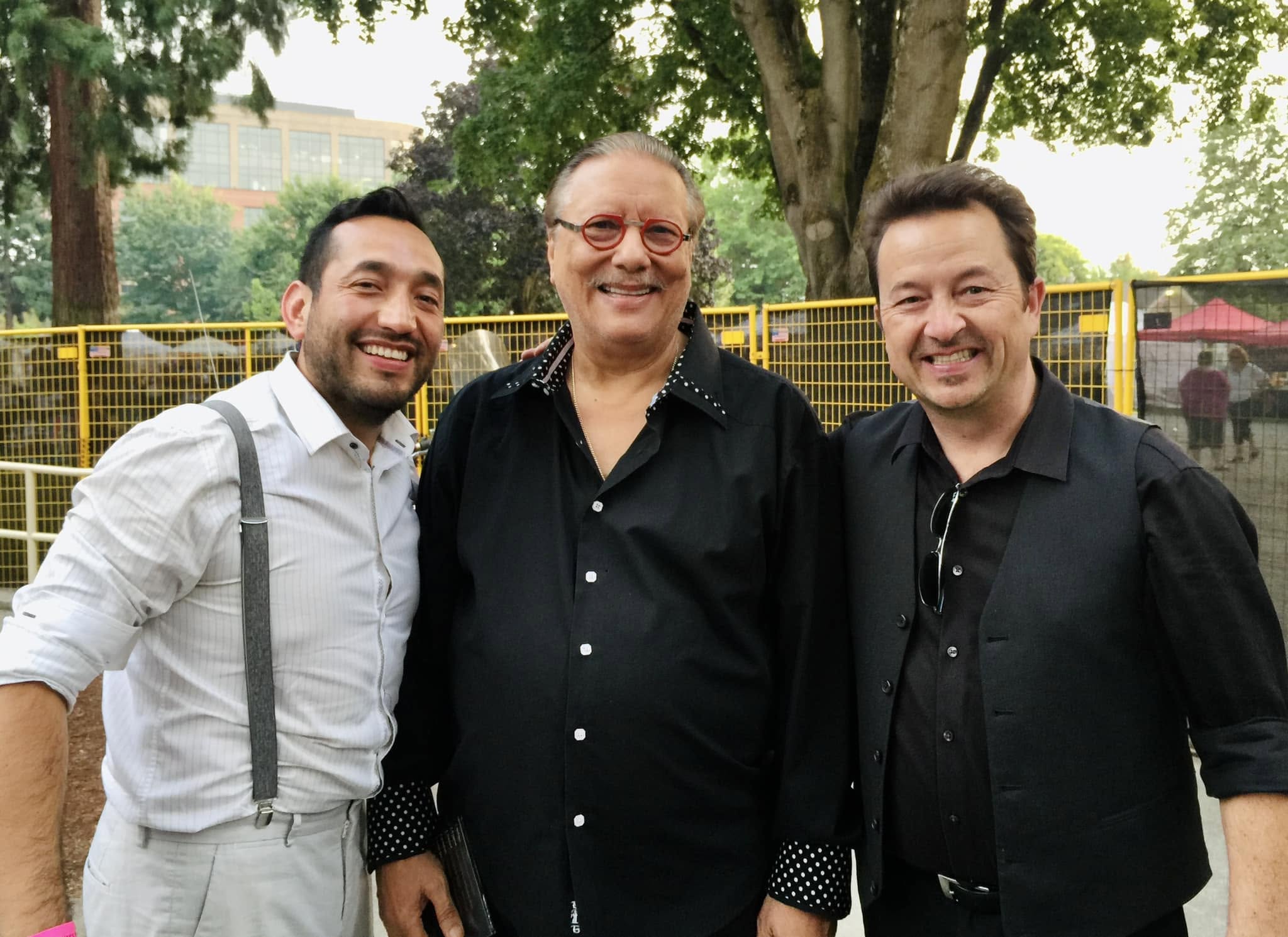 Christian Tumalán with fellow artists at an international performance event