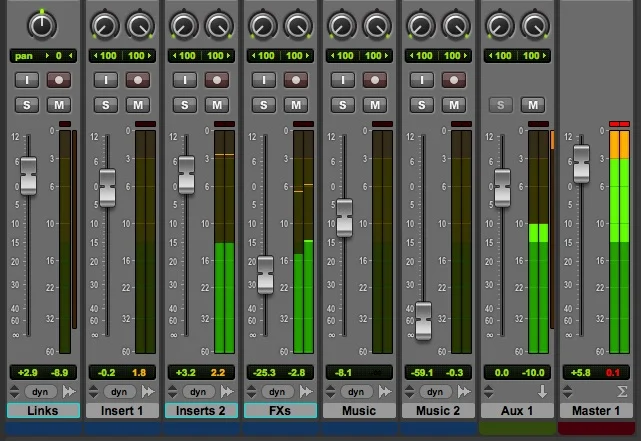 Mixing console with faders and channel strips